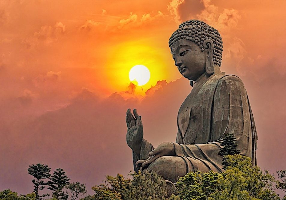 Buddha-Weekly-Amogahasiddhi Tian Tan Giant Buddha at Po Lin Monastery Ngong Ping Hong Kong dreamstime_l_231248321-Buddhism Amoghasiddhi Buddha. The "Tian Tan" or "Giant Buddha" at Po Lin Monastery Ngong Ping in Hong Kong is Amoghasiddhi, held his right hand up in Abhaya Mudra. This huge statue is on top of a mountain, with Amoghasiddhi's gaze looking out on the Samsaric world protectively.