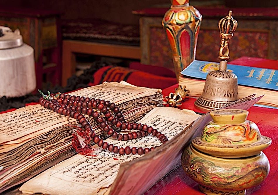 Buddha-Weekly-Bell Vajra and Scripture dreamstime_xl_71183084-Buddhism Vajra and bell and mala are all important "Practice supports." Bell represents support of wisdom in our practice, vajra stands for activity and compassion, and the mala stands for Dharma speech.