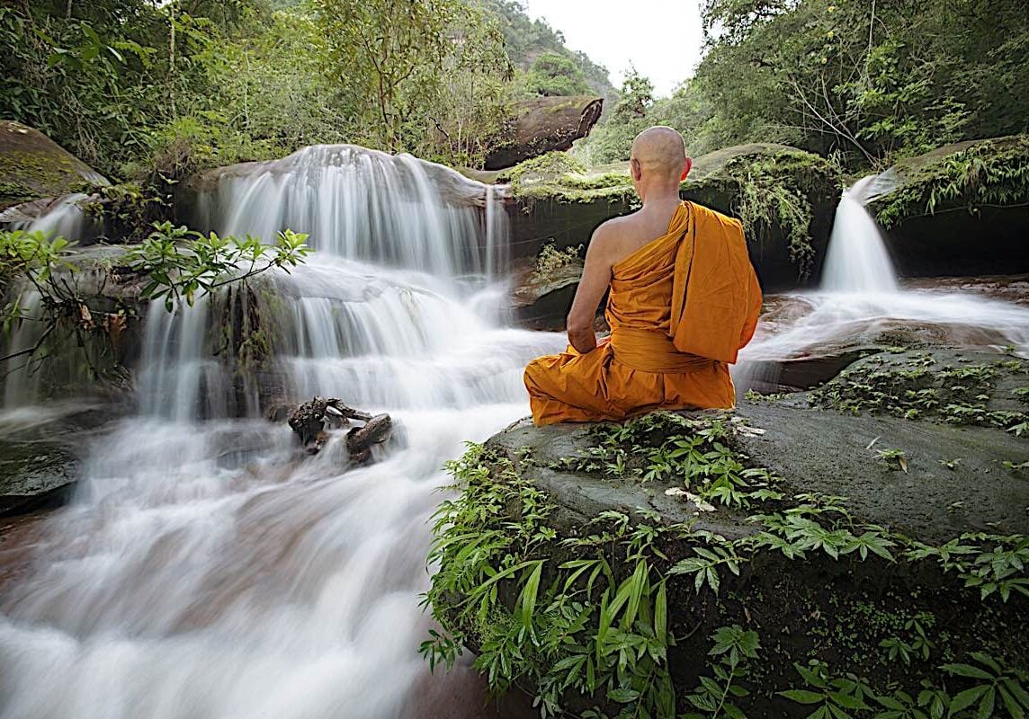 Buddha-Weekly-Buddhist monk meditating at waterfall dreamstime_xxl_155900227-Buddhism Buddha-Weekly-Buddhist monk meditating at waterfall dreamstime_xxl_155900227-Buddhism