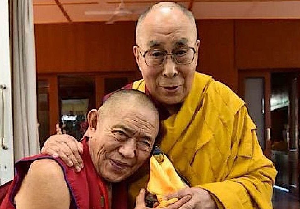 His Holiness the Dalai Lama hugs Kyabje Garchen Rinpoche.