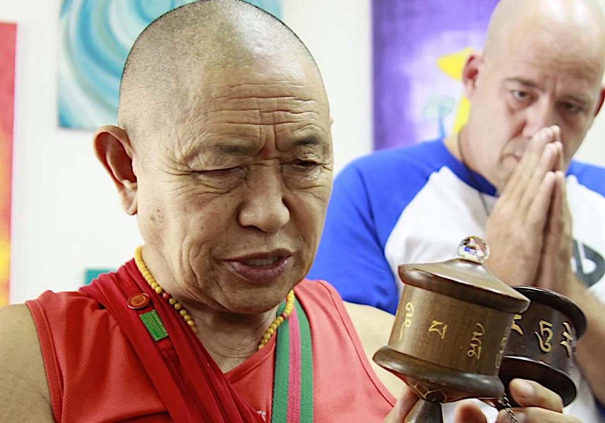 Buddha-Weekly-H.E. Garchen Rinpoche with Micha Strauss at the workshop of Holy Land Prayer Wheels in Israel-Buddhism His Eminence Garchen Rinpoche visiting Holy Land Prayer Wheels in Israel. Behind Rinpoche is Micha Strauss.
