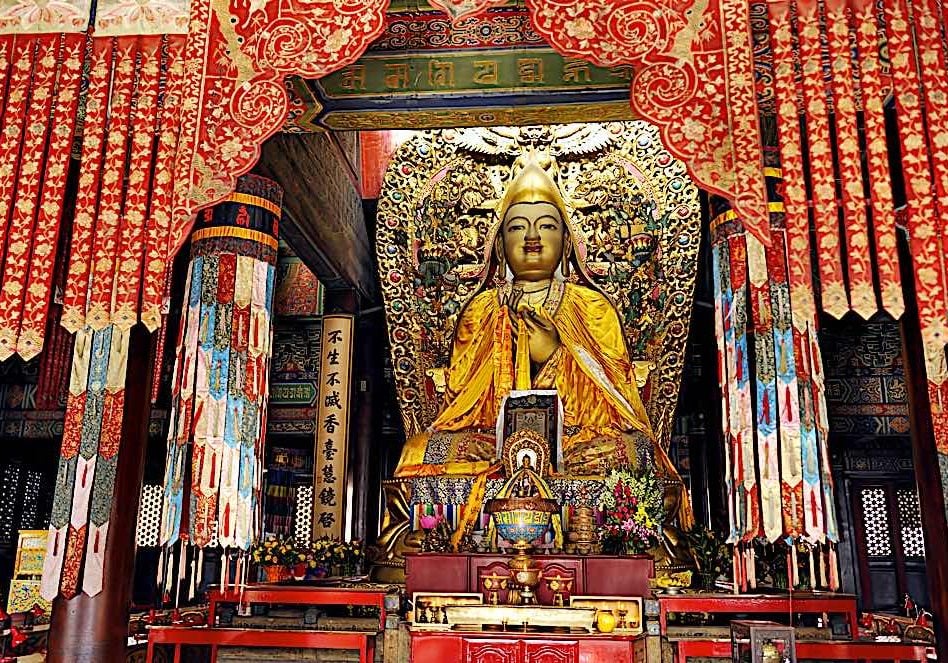 Buddha-Weekly-Lama Tsongkhapa in temple dreamstime_xl_17670782-Buddhism Lama Tsongkhapa altar at a monastery.