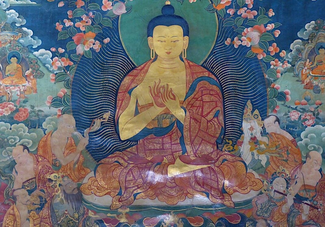 Wall mural of Buddha's first teaching with Dharmachakra teaching mudra at Jokhang Temple Lhasa Tibet Wall mural painting of The Buddha in Dharmchakra Teaching Mudra, representing the Turning of The Wheel of Dharma mudra or pose, Jokhang Temple, Lhasa, Tibet. In Buddhism, the Dharma Chakra symbolizes "teaching." The Jokhang is a Buddhist temple in Barkhor Square in Lhasa, the capital city of Tibet and became a UNESCO World Heritage Site as an extension of the Potala Palace in 2000.
