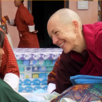 Emma Slade Buddhist Nun with Child in Bhutan